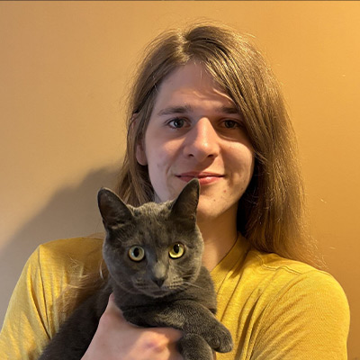 a woman holding a cat